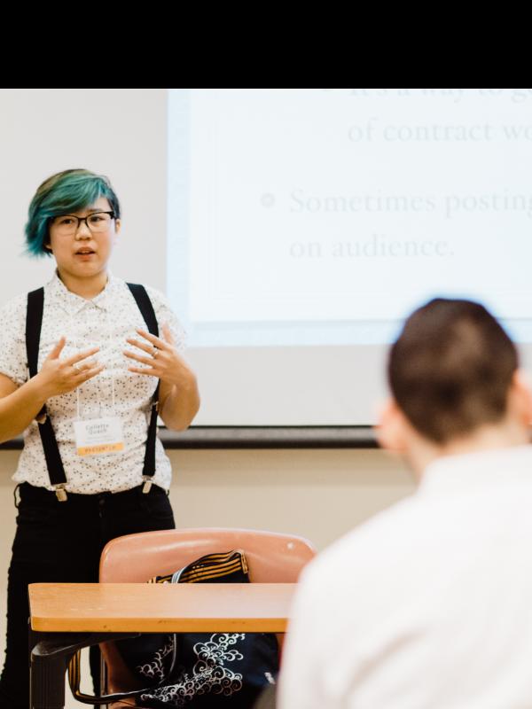Student speaking at conference