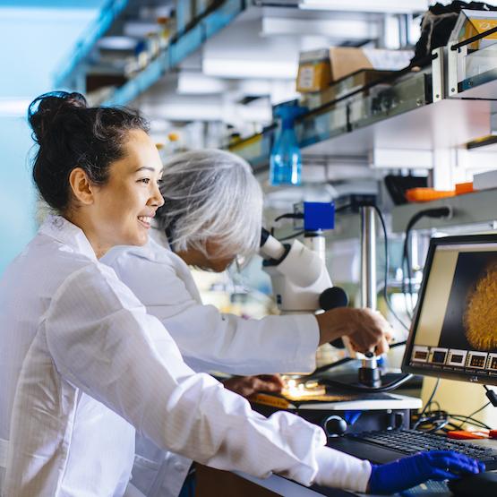 Student and professor in lab
