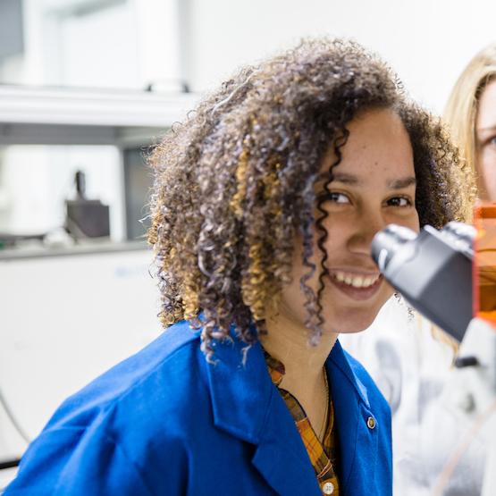 Student at microscope