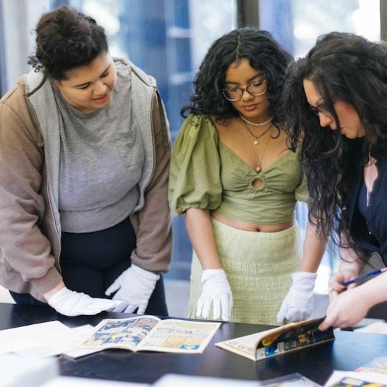Students examining archival material